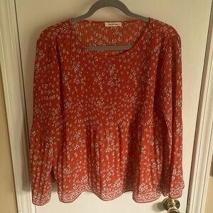 Bell sleeve flowy floral top. Size Large/XL. Beautiful silky material.
